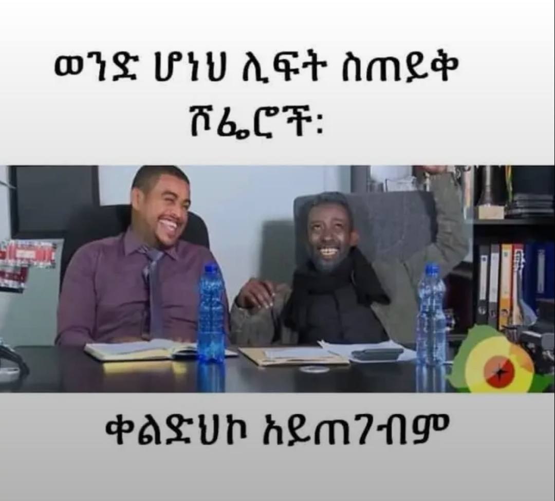 a man and woman sitting at a table